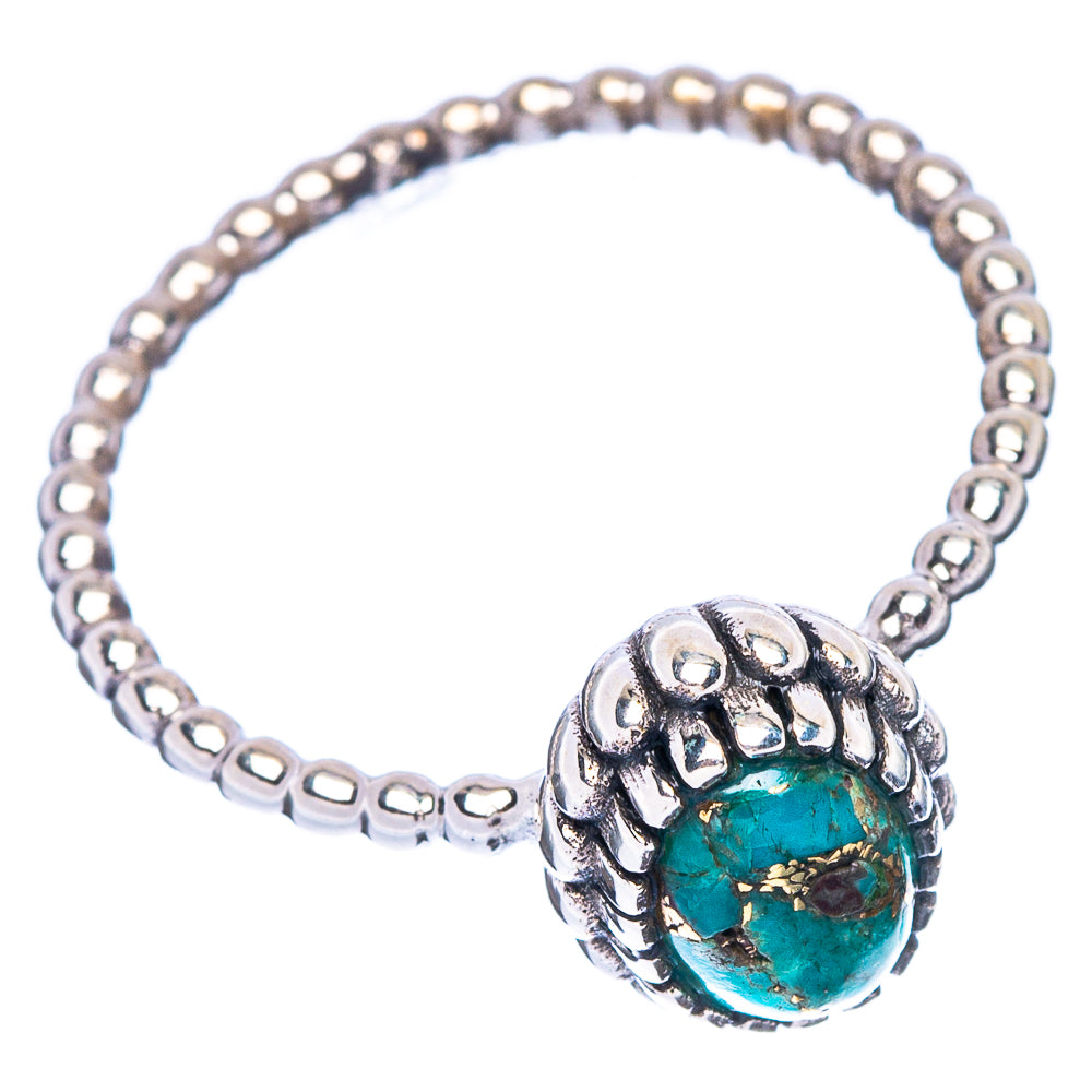 Turquoise cabochon silver ring with detailed oval bezel and small bead chain, side view