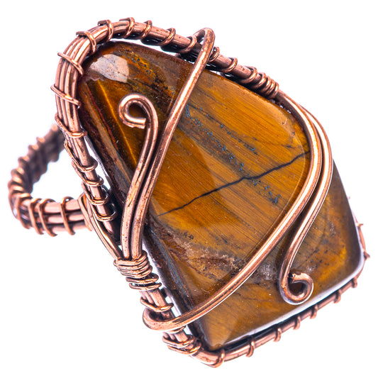Oxidized copper wire ring with tiger's eye teardrop stone and spiral detail
