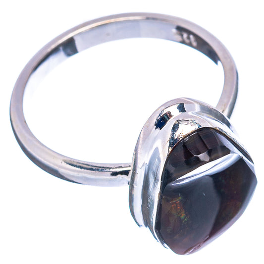 Sterling silver ring with dark fire agate oval gemstone on open band