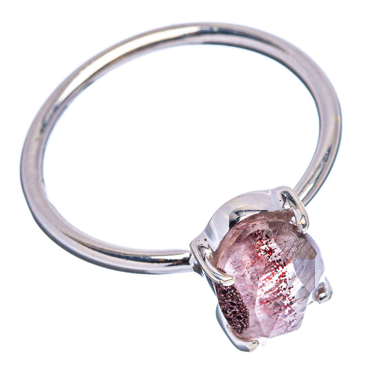 Sterling silver faceted cacoxenite ring with oval pink stone and arched band