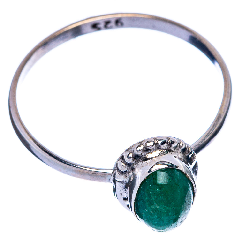 Sterling silver ring with oval emerald-green cabochon and textured shoulders