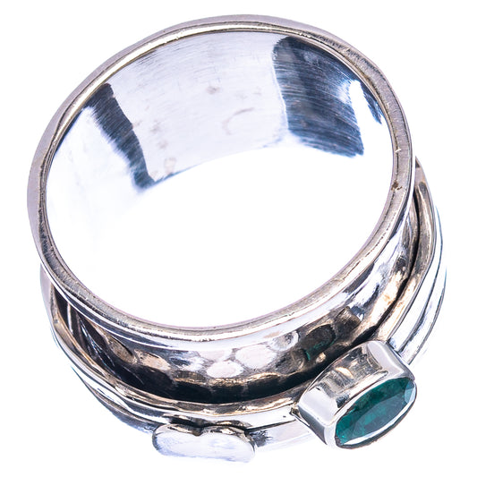 Sterling silver emerald ring with oval green stone on polished split band
