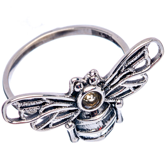 Sterling silver dainty bee ring with citrine-colored round stone and engraved wings