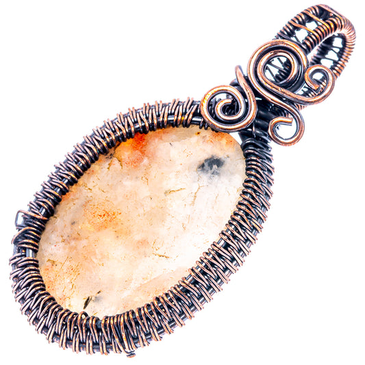 Oxidized copper wire-wrapped teardrop pendant with oval sunstone cabochon, spiral loops