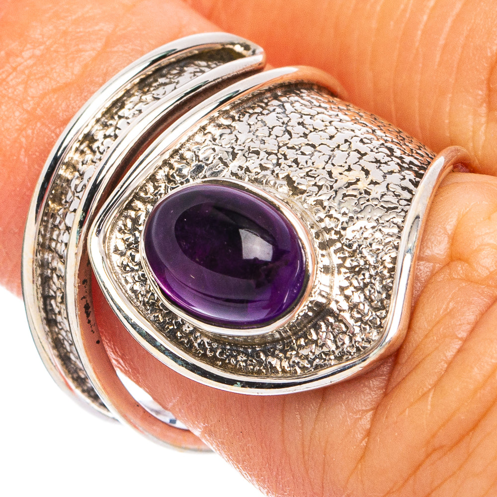Dainty amethyst cabochon sterling silver ring with rounded bezel setting