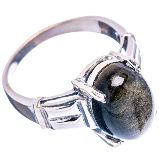 Sterling silver ring with dark oval cabochon, arched filigree setting and polished band