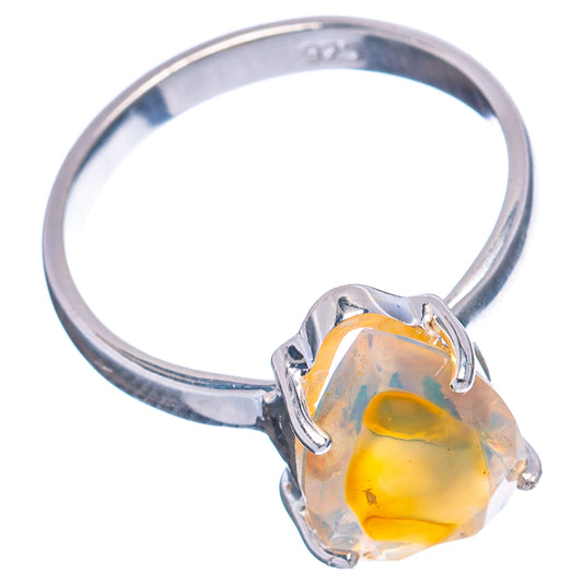 Sterling silver size 7 opal ring with yellow stone and four-prong bezel setting