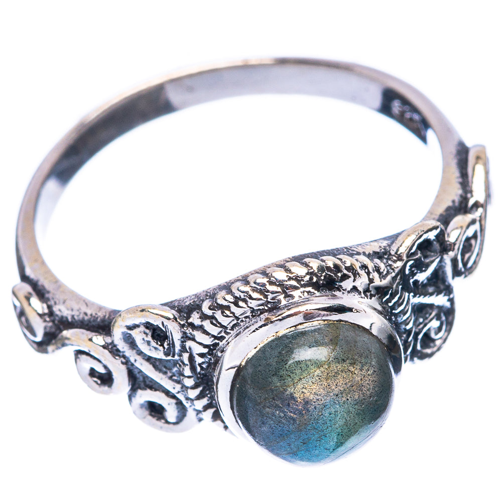 Sterling silver labradorite ring with oval blue-green stone, detailed side filigree