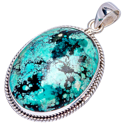 Turquoise oval cabochon pendant in .925 sterling silver, detailed rope-edged frame.