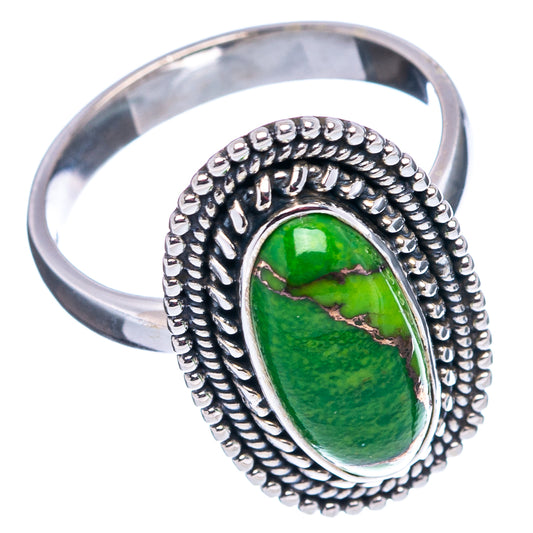 Sterling silver ring featuring green oval turquoise cabochon and braided bezel