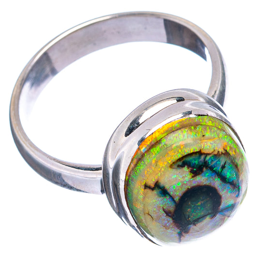 Sterling silver opal ring showing round iridescent black, green, and gold stone