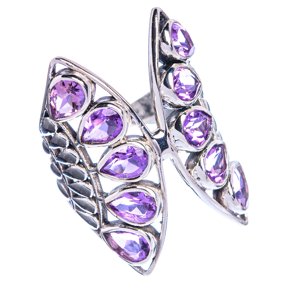925 sterling silver amethyst ring with faceted purple stones on open prongs, side view