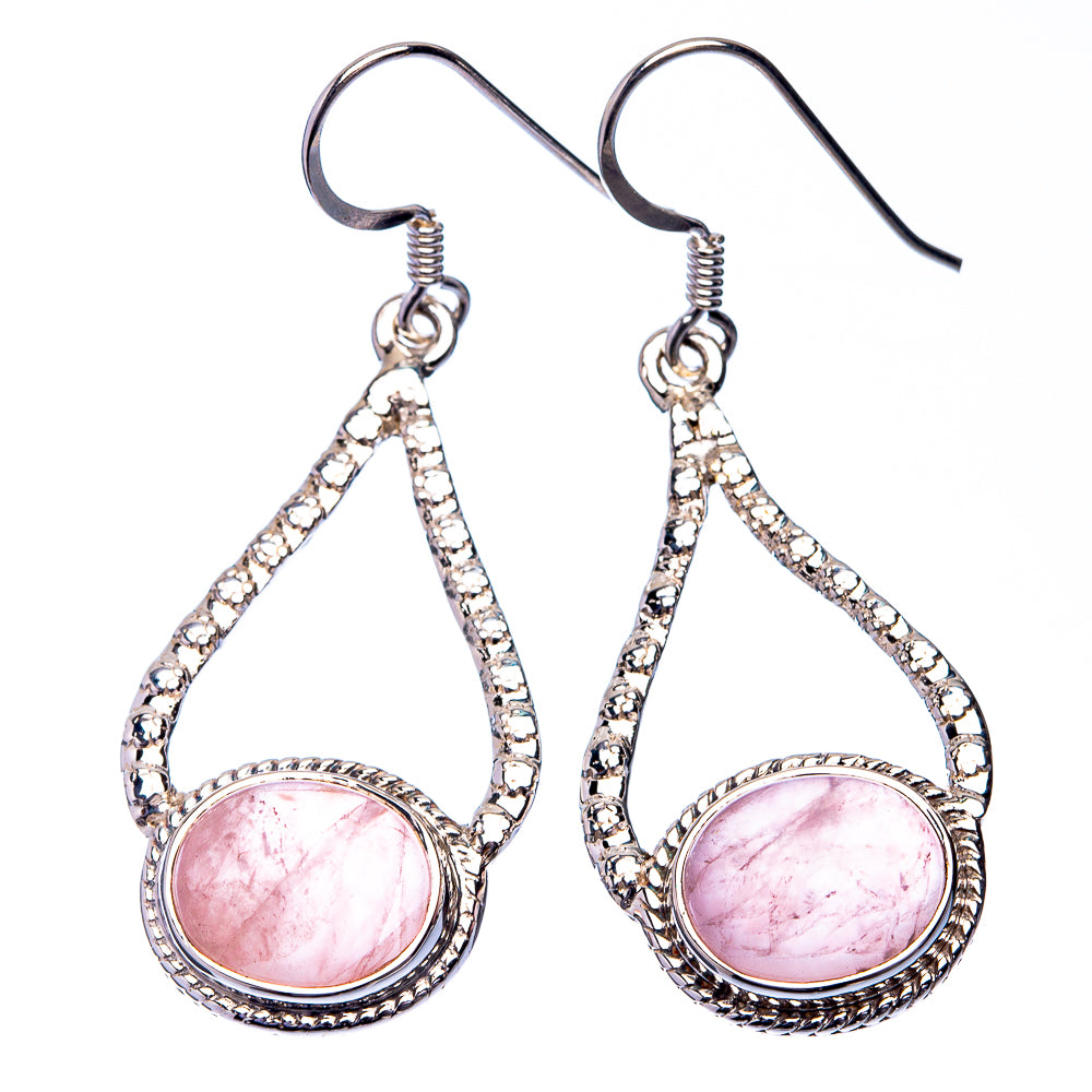 Sterling silver rose quartz teardrop earrings with circular pink cabochon bezel and hooks
