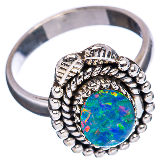 Sterling silver opal ring with oval green-blue gemstone and ornate beaded band, size 7