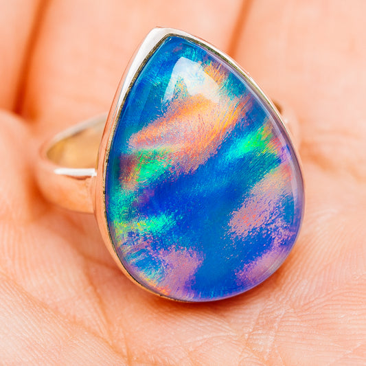 Sterling silver oval opal ring with multicolor blue-green iridescence