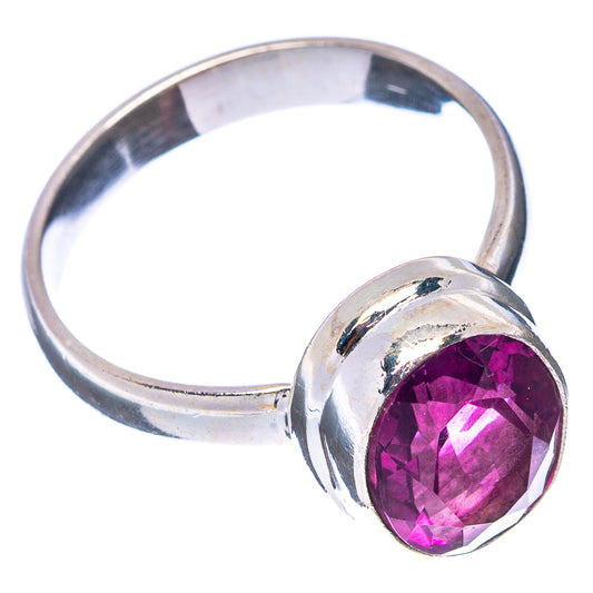 Sterling silver band ring with round faceted pink fluorite stone