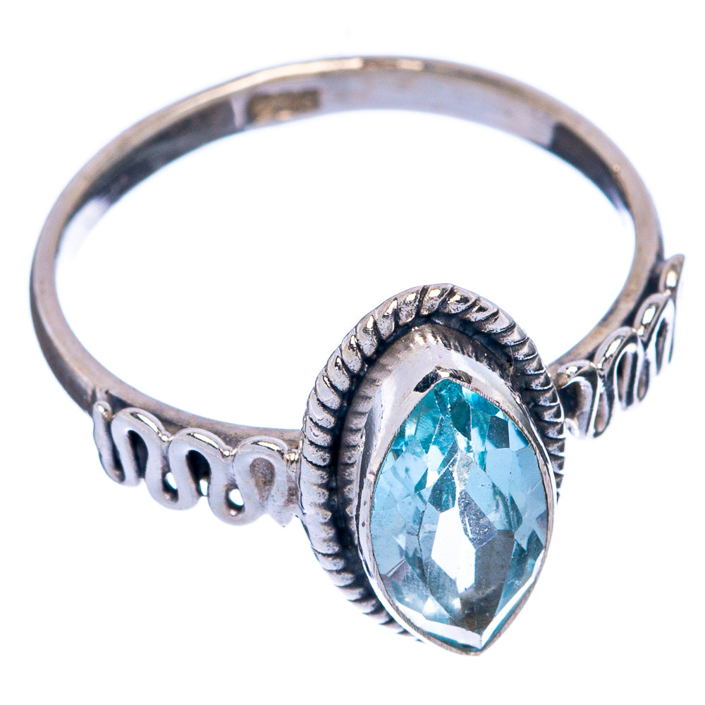 Sterling silver dainty ring with oval blue gemstone and ornate split band