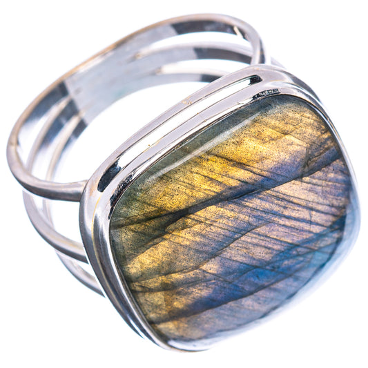 Sterling silver ring with oval labradorite, blue and gold flash, angled bezel