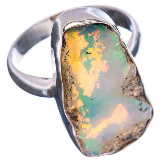 Sterling silver oval opal ring, raw stone bezel with iridescent green-orange flashes