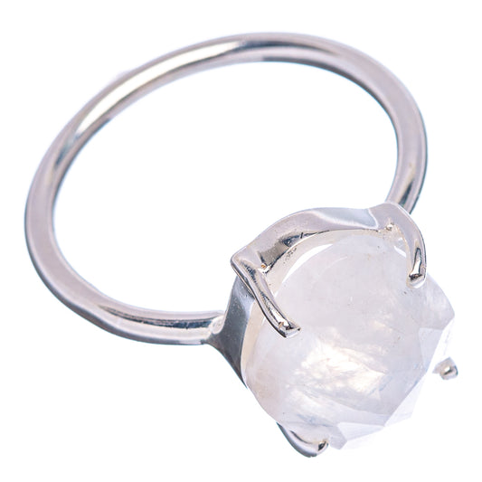 Silver band ring with faceted white moonstone and three claw prongs