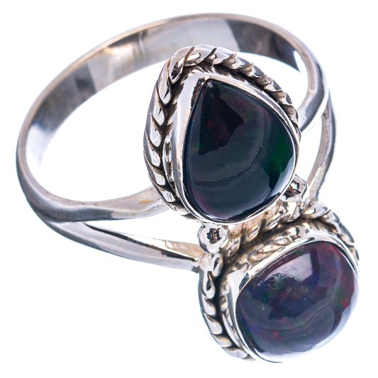 Sterling silver oval opal ring with dark green main stone and smaller matching oval, size 10.5