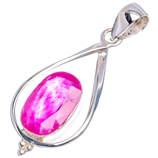 Sterling silver teardrop pendant with oval magenta ruby glass center, loop bail