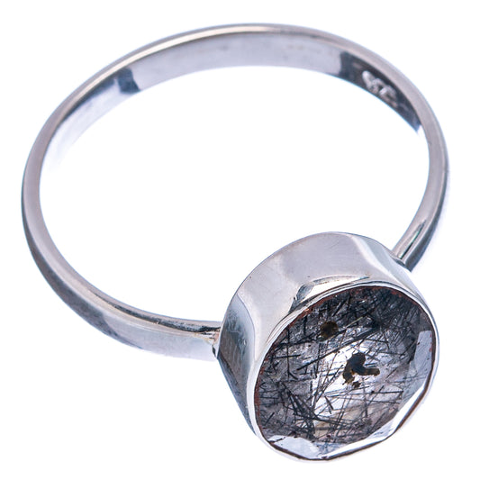 Round tourmalinated quartz cabochon set on sterling silver band, side view.
