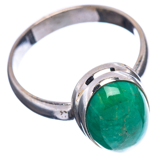 Sterling silver ring with oval green cabochon and open band