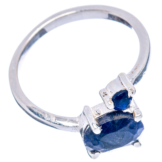 Sterling silver ring with blue gemstone cluster and four-prong setting, side view
