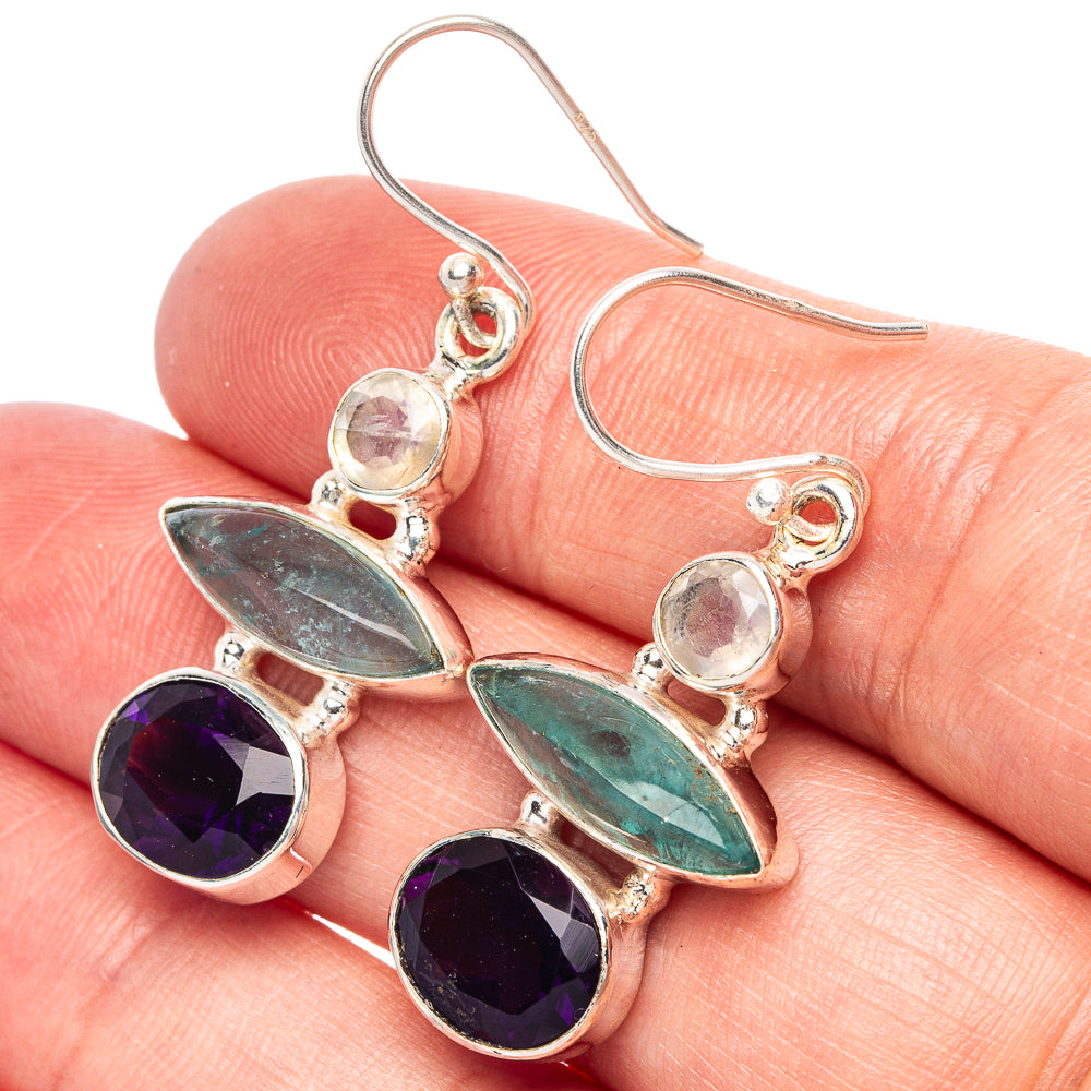 Sterling silver drop earrings with purple and green gemstones and fishhook backs