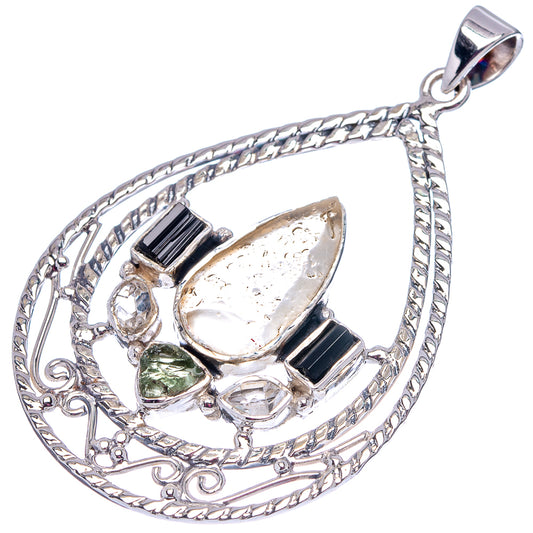 Sterling silver drop pendant with black square accents and green teardrop stone