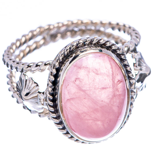 Rose quartz oval sterling silver ring with braided bezel and floral scroll band