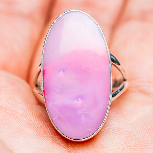 Oval opal ring with pink-lavender iridescent cabochon and silver band, size 8