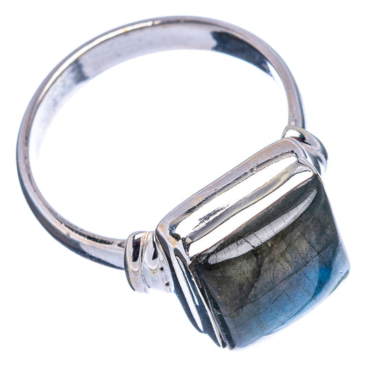 Sterling silver ring with raised labradorite stone, open cuff detail and dark blue flash