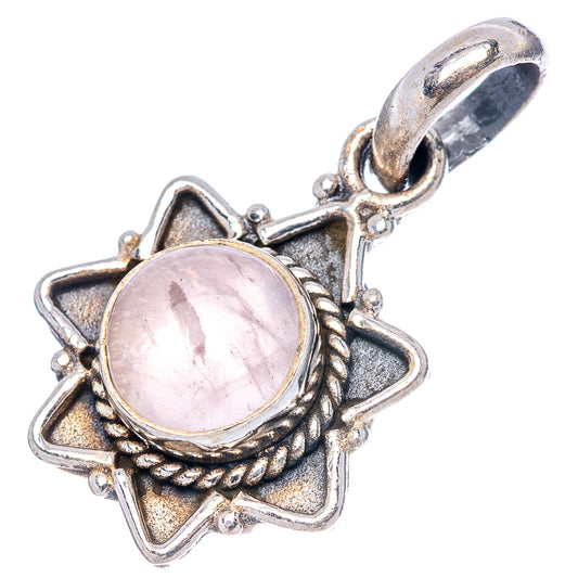 Rose quartz pendant with oval pink cabochon, sterling silver starburst border and bail