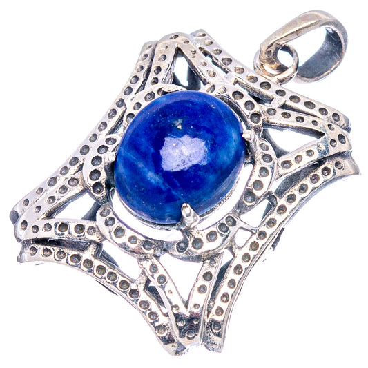 Ornate sterling silver lapis lazuli pendant with round blue stone and loop bail