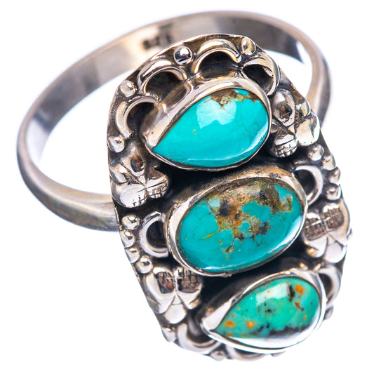 Adjustable sterling silver ring with oval turquoise cabochons and decorative borderwork