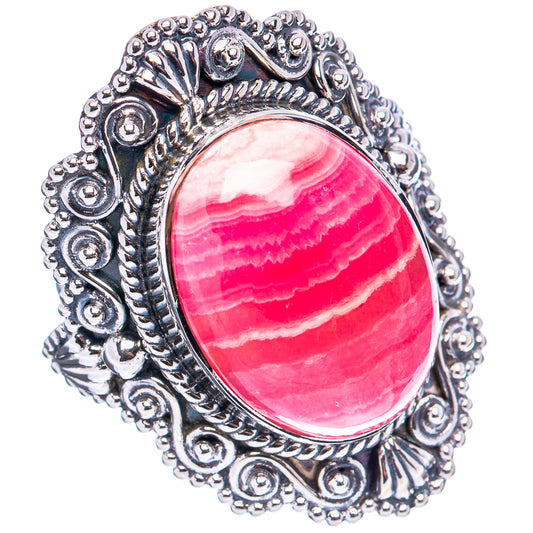 Sterling silver ring with oval rhodochrosite cabochon and ornate filigree setting, size 7.5