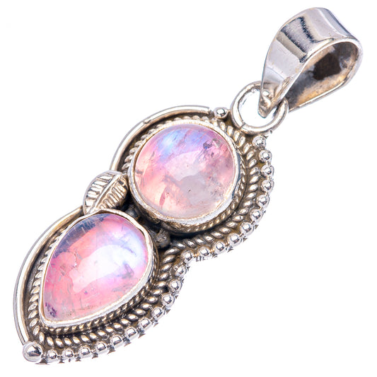Sterling silver pink moonstone pendant with two oval cabochons, bezelwork and hanging bail.