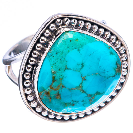 Turquoise cabochon sterling silver ring, oval setting with textured beaded border