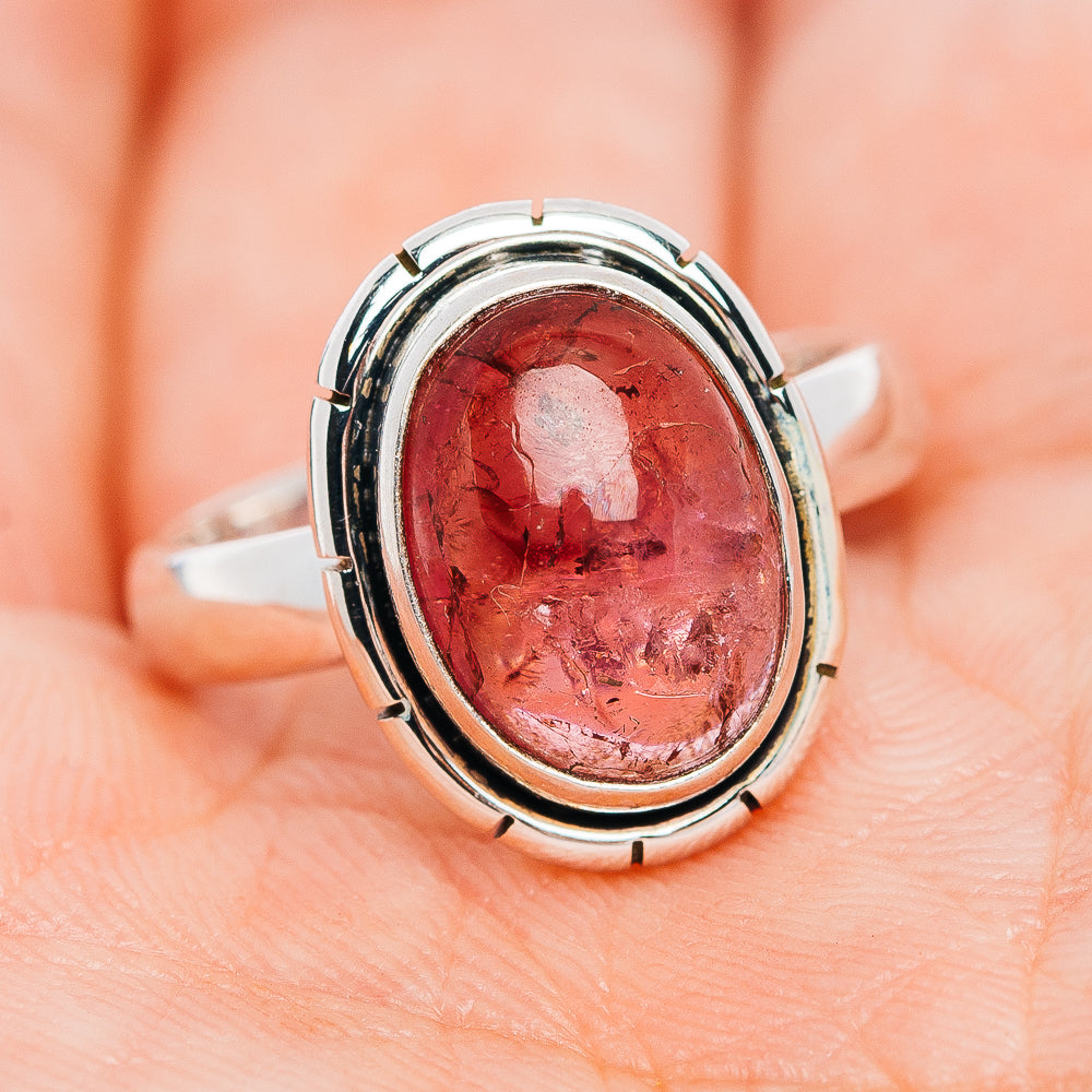 Pink tourmaline cabochon oval bezel on .925 sterling silver ring, close-up