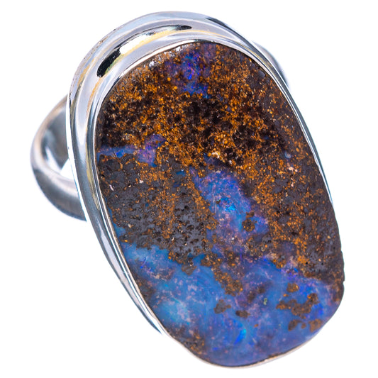 Oval boulder opal ring in .925 sterling silver, vivid blue flashes on dark stone