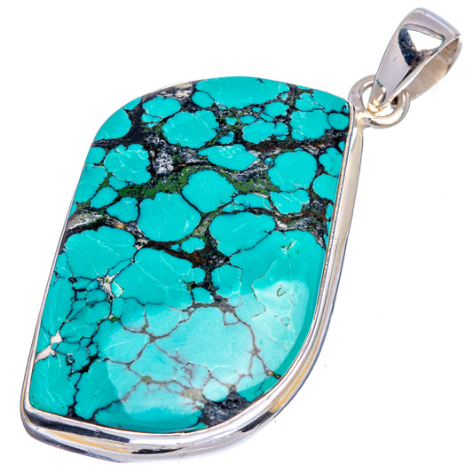 Large turquoise teardrop pendant with black matrix, .925 sterling silver loop bail.