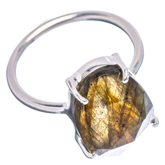 Faceted labradorite ring in .925 sterling silver with oval dark stone and four-prong setting