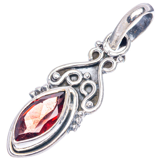 Sterling silver garnet pendant with marquise red gemstone and ornate scrollwork