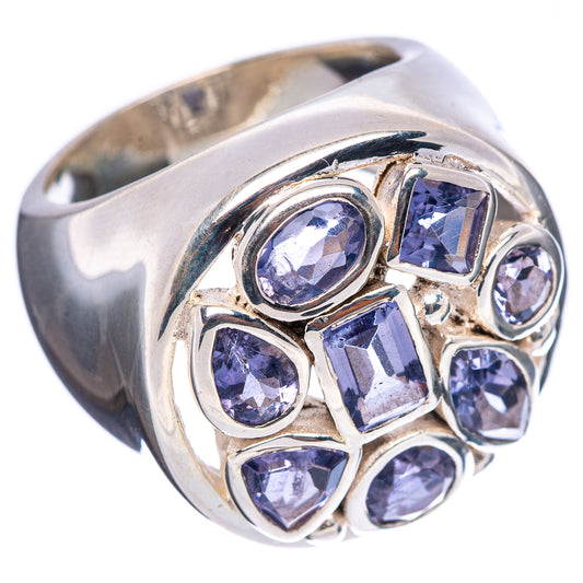 Sterling silver ring with side view faceted purple-blue gemstones in bezel cluster