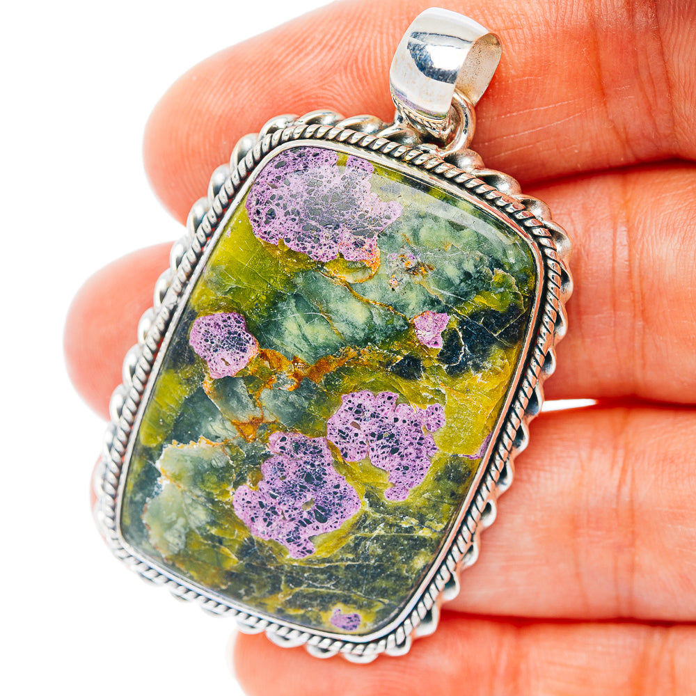 Sterling silver stichtite pendant with rectangular bezel and multicolor stone cabochon