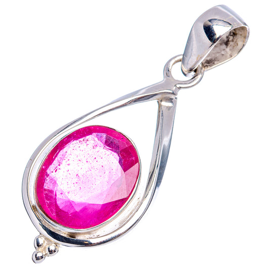 Oval pink-red gemstone in polished teardrop sterling silver pendant with bail