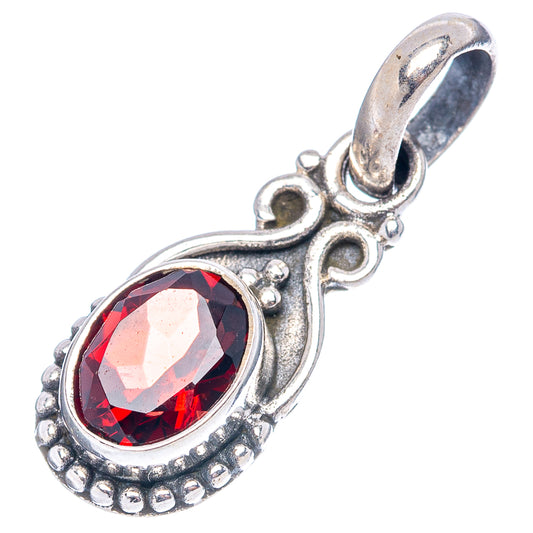 Garnet pendant with oval red gemstone, .925 sterling silver ornate frame and top loop