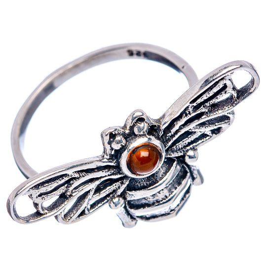Sterling silver bee ring with orange cabochon and wing detail, slim band